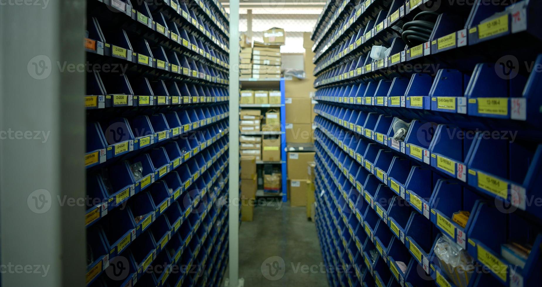 Small blue electronic component storage compartment. systematically stored photo