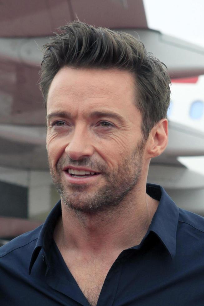 LOS ANGELES, SEPT 23 -  Hugh Jackman arrives as Virgin America unveils new DreamWorks  Reel Steel  plane at LAX Airport on September 23, 2011 in Los Angeles, CA photo