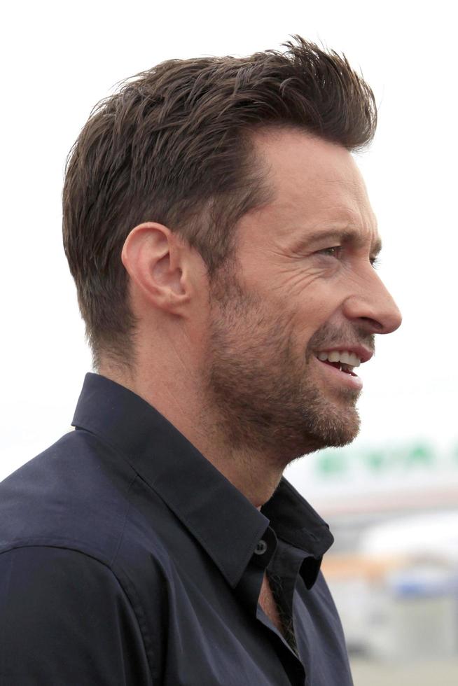 LOS ANGELES, SEPT 23 -  Hugh Jackman arrives as Virgin America unveils new DreamWorks  Reel Steel  plane at LAX Airport on September 23, 2011 in Los Angeles, CA photo