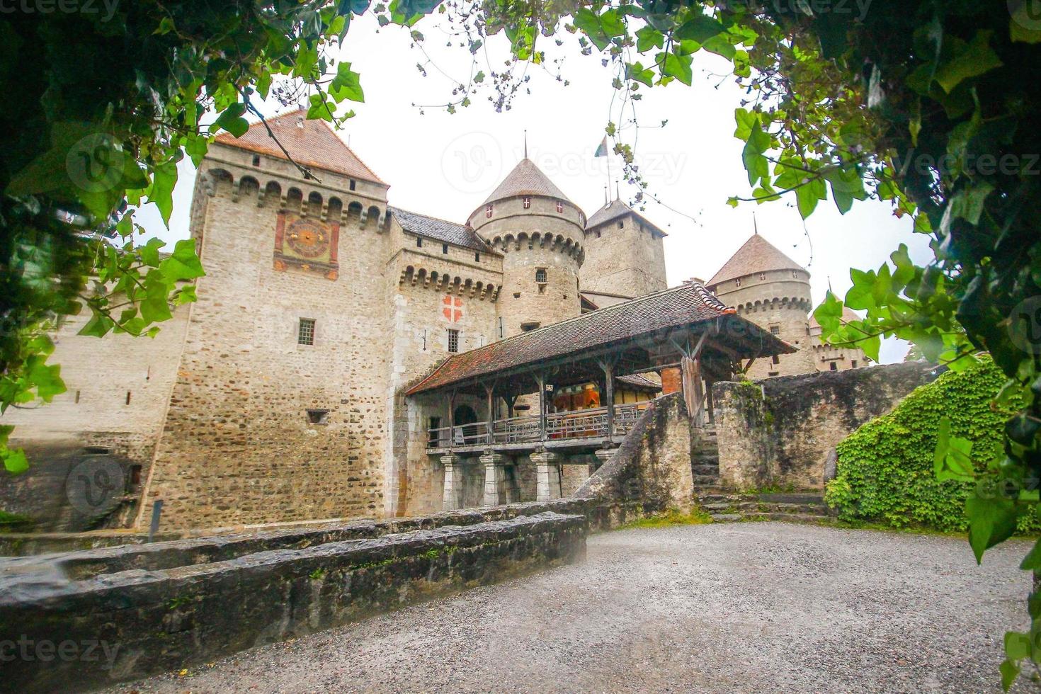 Chillon Castle, or Chateau de Chillon, an island castle located on Lake Geneva, Montreux, Switzerland photo