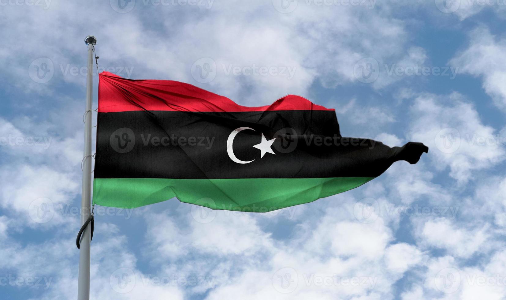 Libya flag - realistic waving fabric flag. photo