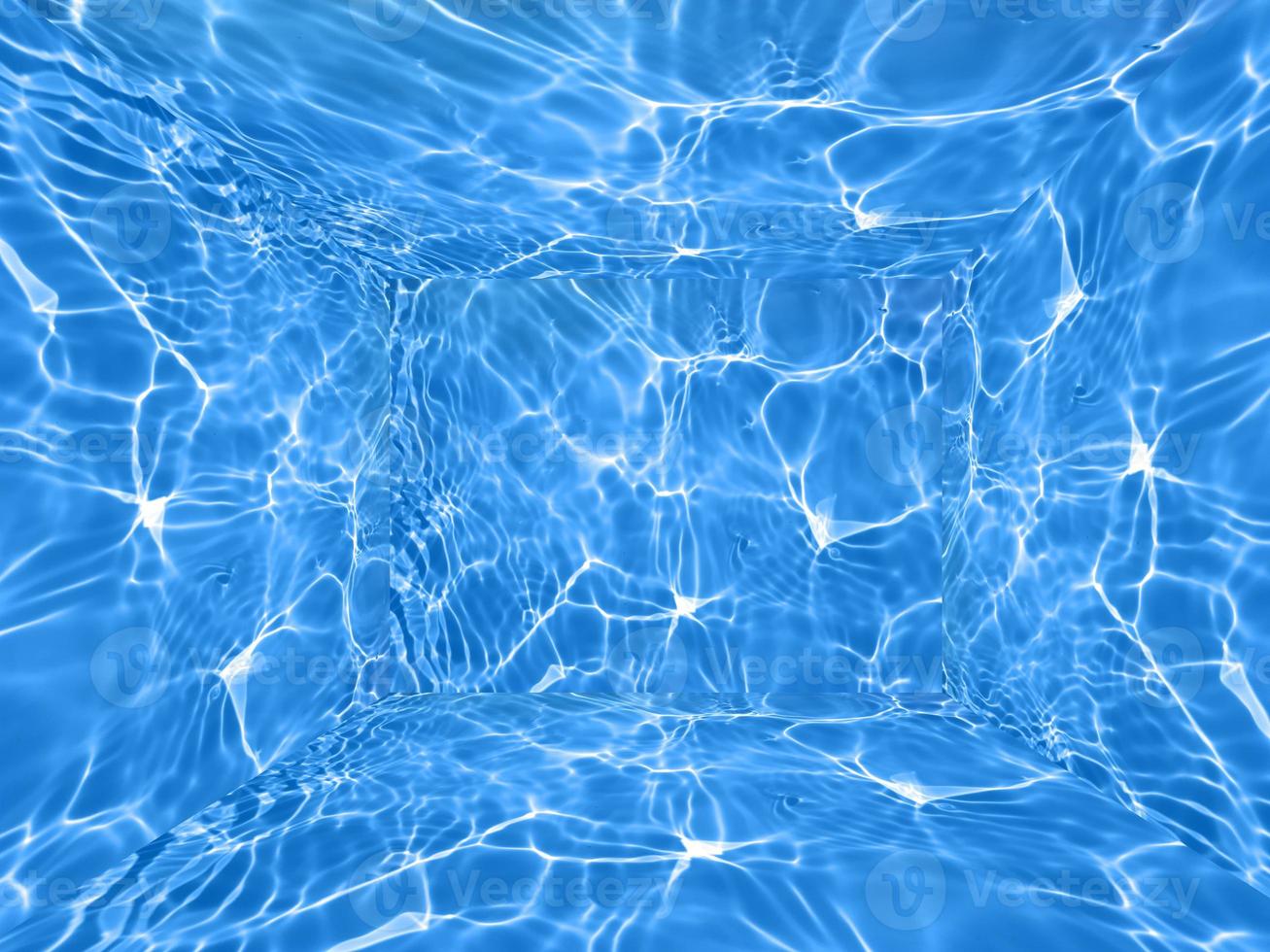 Defocus blurred blue water splash room for show case background. waterdrops detail the background. Water splash, water spray background. Calm orange background with water drop. photo