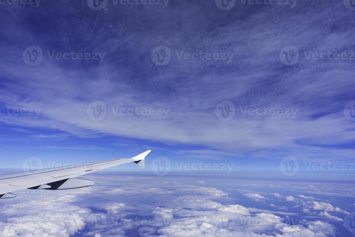 Clouds and mountains, view from an airplane photo