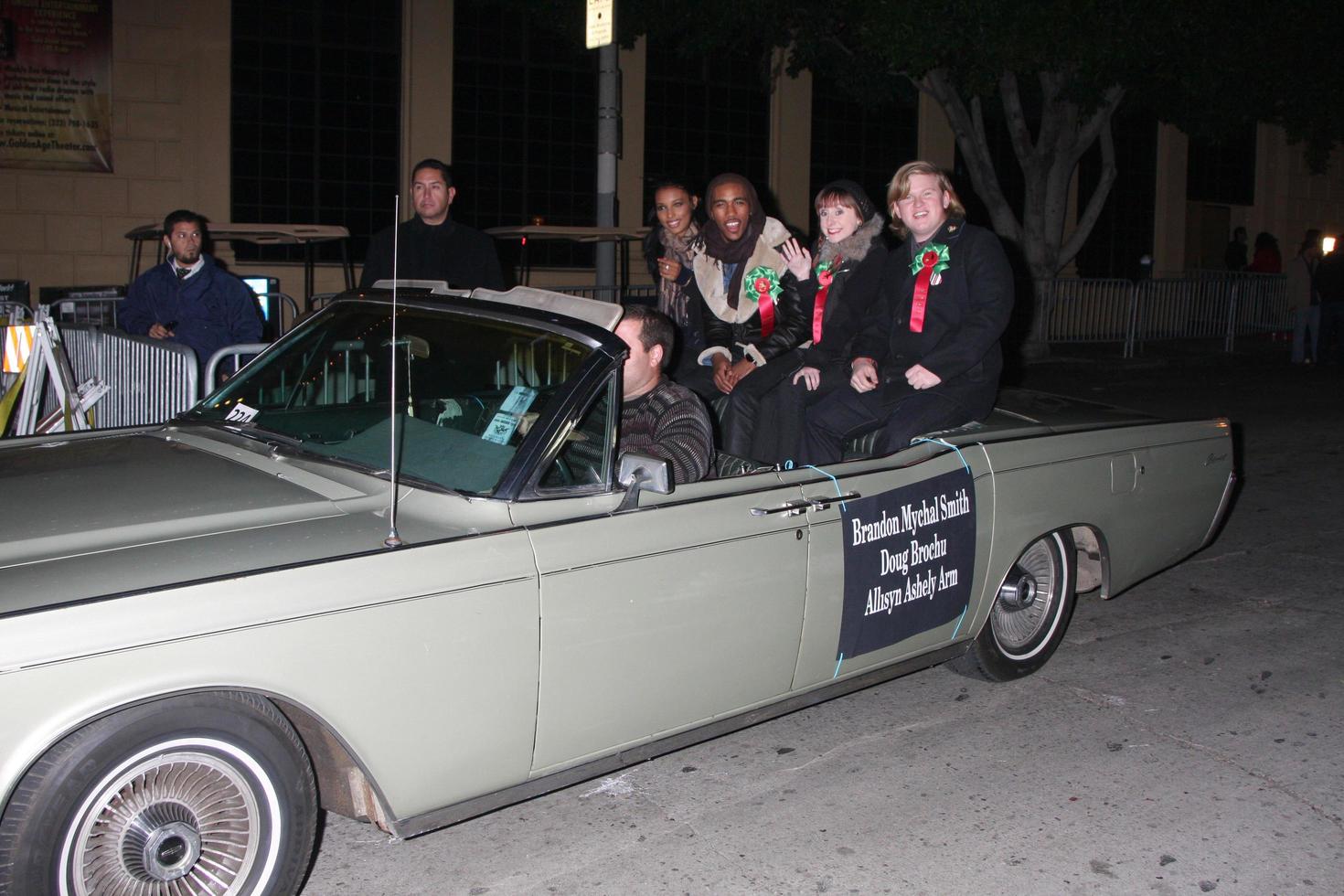 LOS ANGELES, NOV 28 -  Brandon Mychal Smith, Allisyn Ashley Arm, Doug Brochu arrives at the 2010 Hollywood Christmas Parade at Hollywood Boulevard on November 28, 2010 in Los Angeles, CA photo