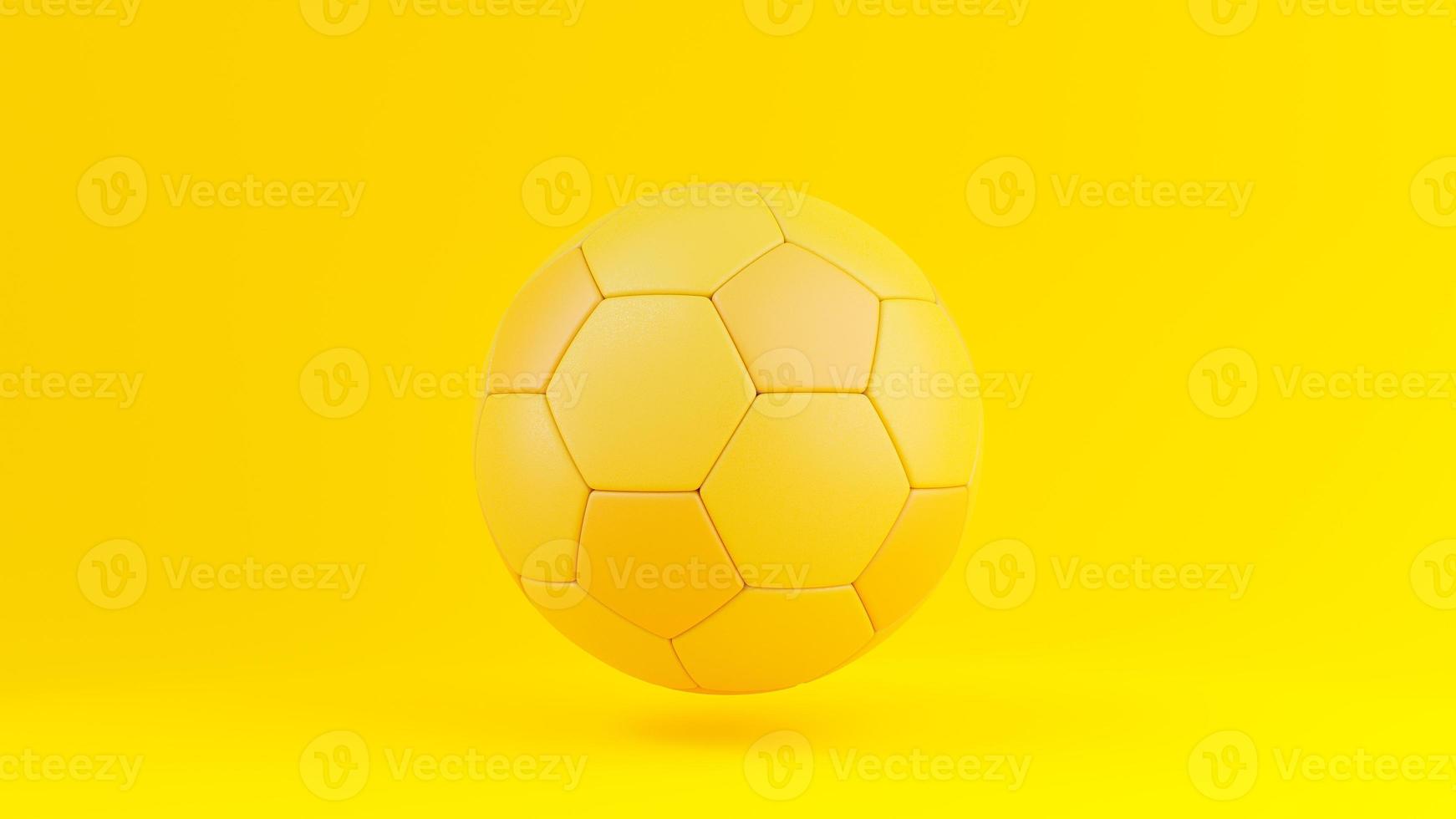 balón de fútbol amarillo sobre fondo amarillo. foto