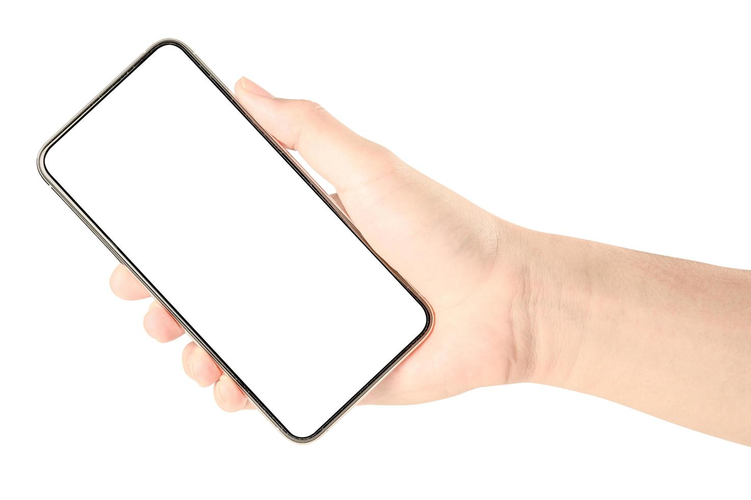 Hand holding phone isolated on white background with clipping path. photo
