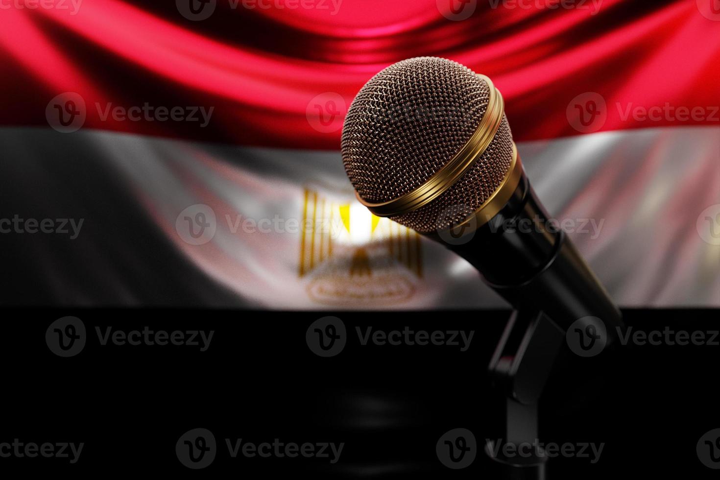 Microphone on the background of the National Flag of Egypt, realistic 3d illustration. music award, karaoke, radio and recording studio sound equipment photo