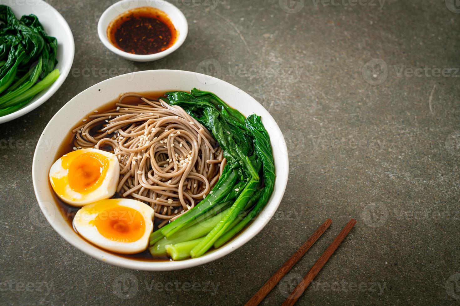 ramen noodles with egg - vegan or vegetarian food style photo