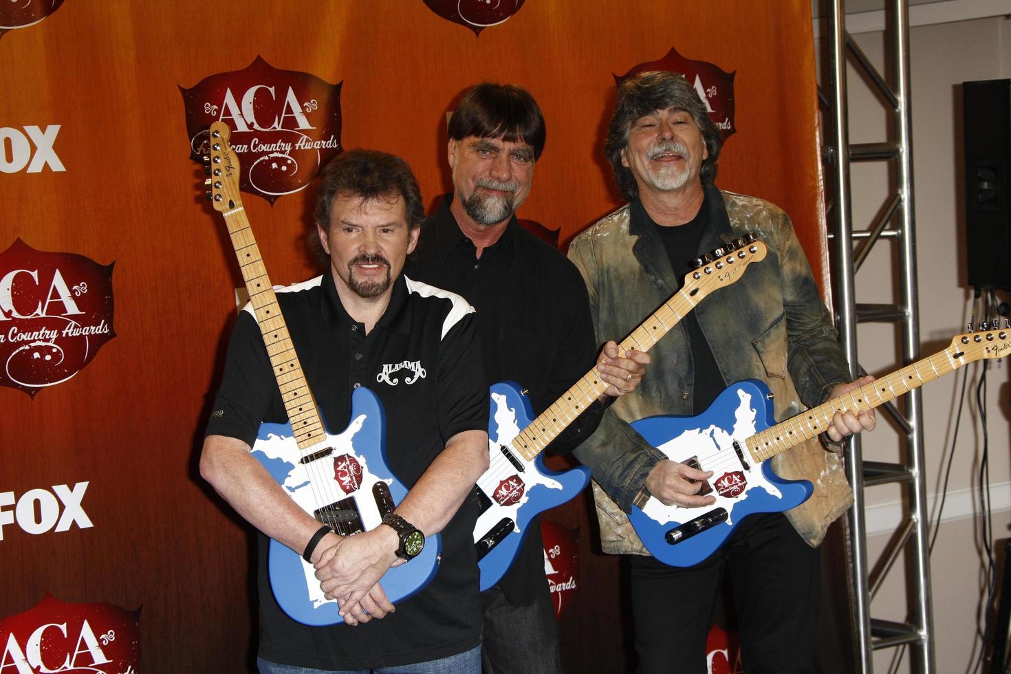 LOS ANGELES  DEC 5 - Jeff Cook, Teddy Gentry, Randy Owen of Alabama in the Press Room of the American Country Awards 2011 at MGM Grand Garden Arena on December 5, 2011 in Las Vegas, NV photo