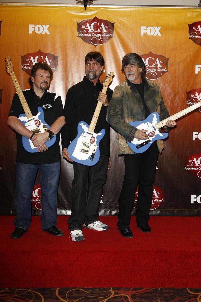 LOS ANGELES  DEC 5 - Jeff Cook, Teddy Gentry, Randy Owen of Alabama in the Press Room of the American Country Awards 2011 at MGM Grand Garden Arena on December 5, 2011 in Las Vegas, NV photo