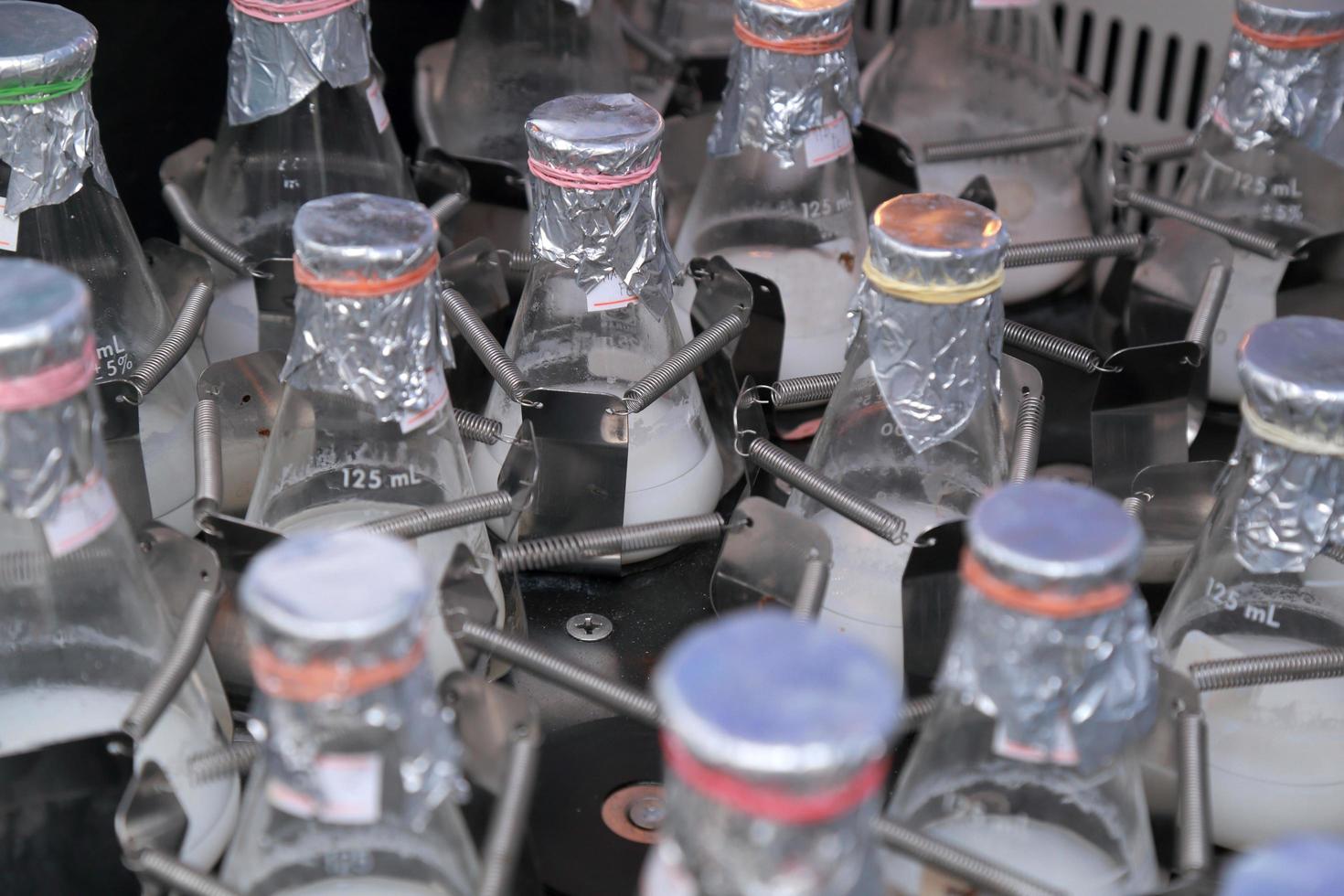 Lab bottles shaking liquid tissue microbial culture photo