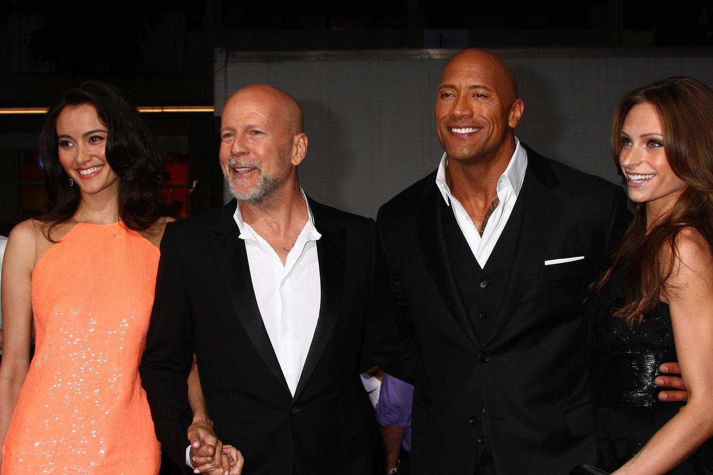 LOS ANGELES, MAR 28 - Emma Heming, Bruce Willis, Dwayne Johnson, Lauren Hashian arrives at the G.I. Joe - Retaliation  LA Premiere at the Chinese Theater on March 28, 2013 in Los Angeles, CA photo