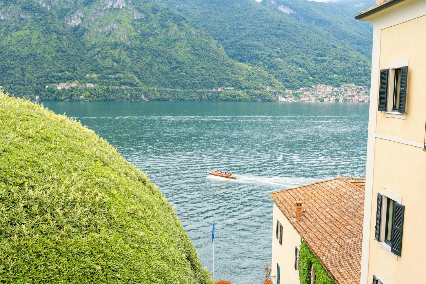 Boats sailing on lake Como photo