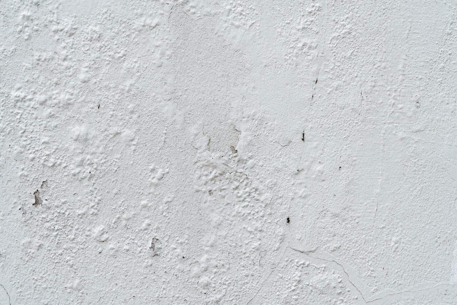 Old gray peeling paint wall photo