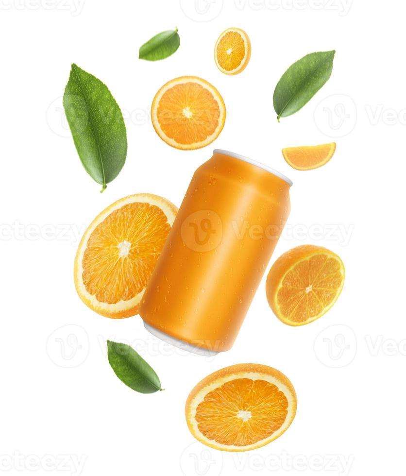 Aluminum orange soda can and falling juicy oranges with green leaves isolated on background. Flying defocusing slices of oranges. Applicable for fruit juice advertising photo