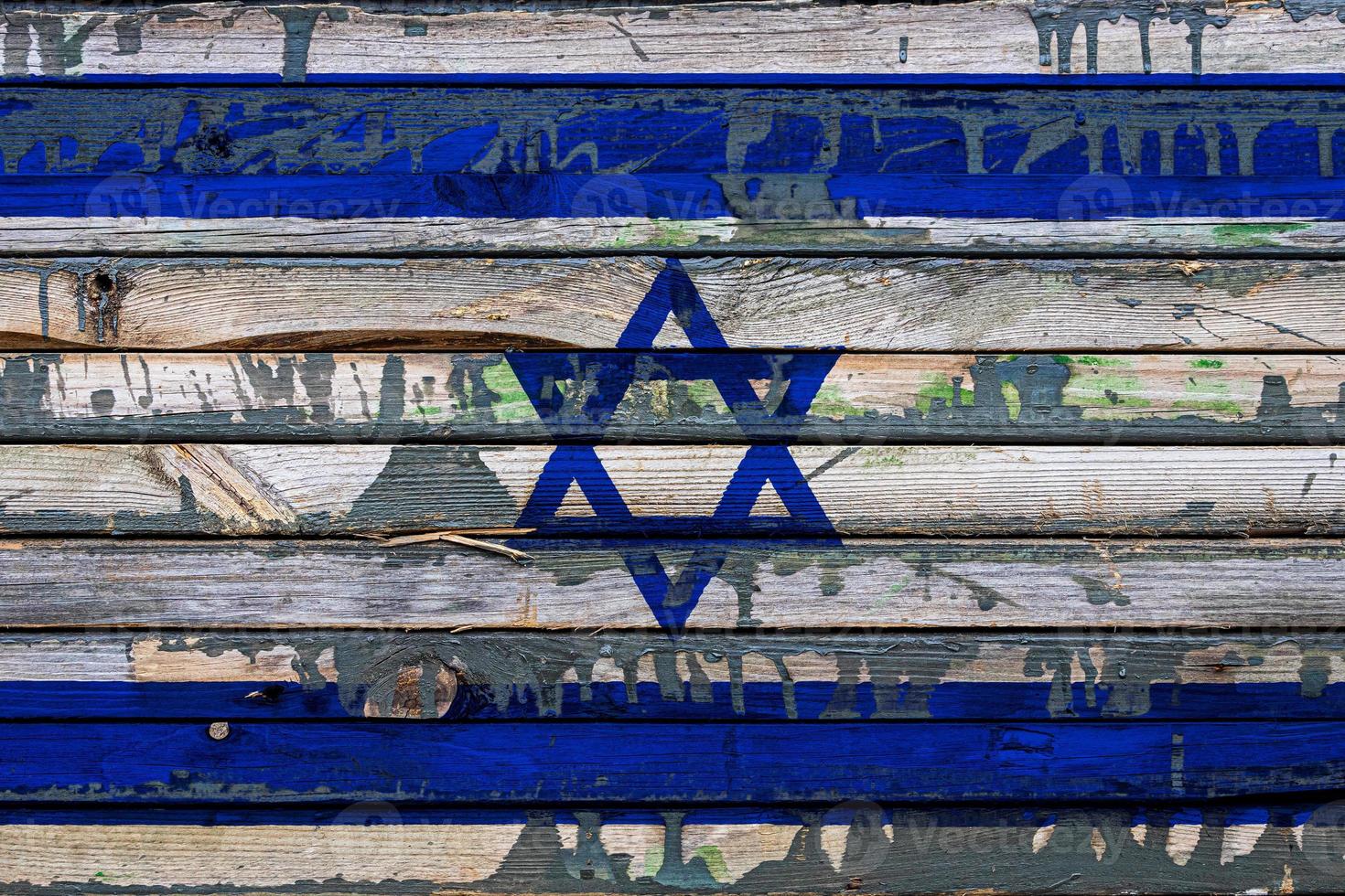 The national flag of Israel  is painted on uneven boards. Country symbol. photo