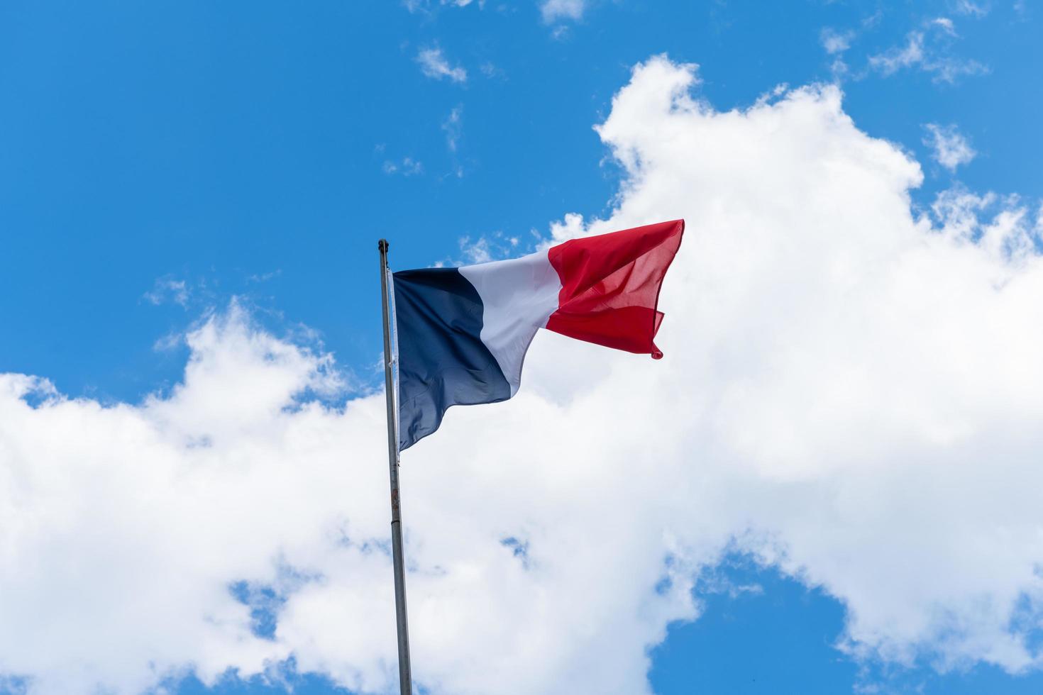 French flag waving in the wind photo