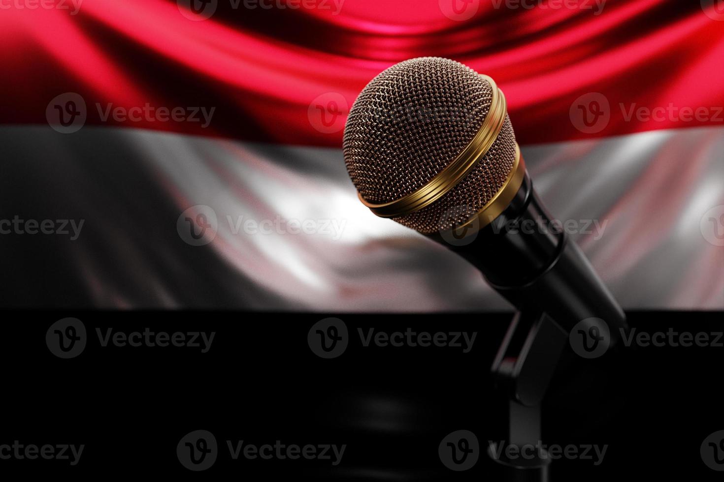 Microphone on the background of the National Flag of Yemen, realistic 3d illustration. music award, karaoke, radio and recording studio sound equipment photo