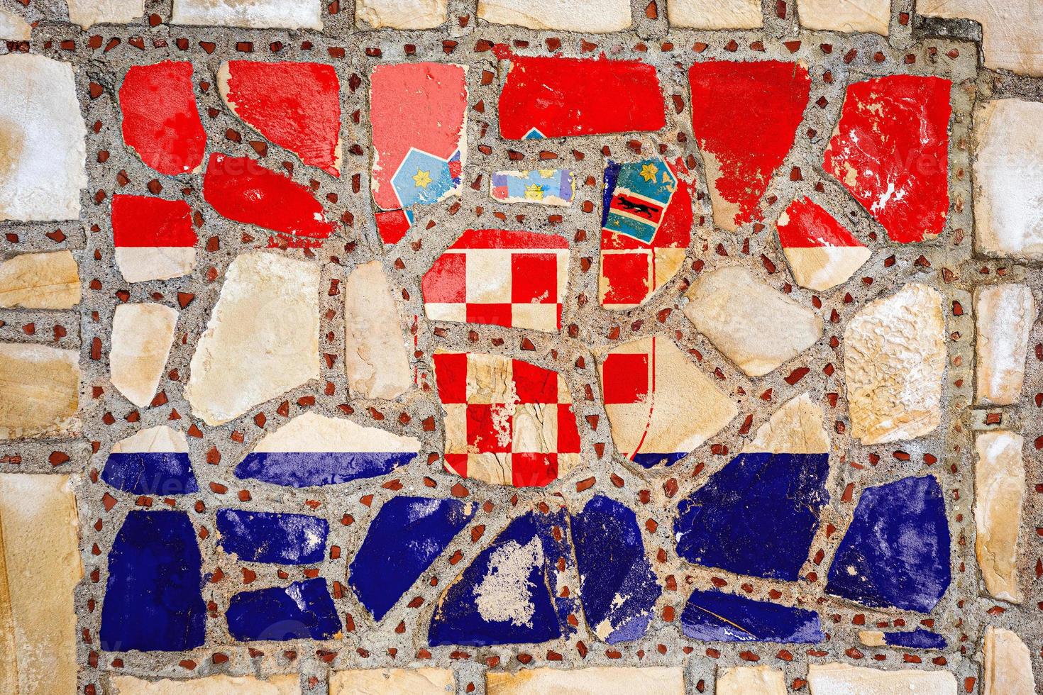National flag of  Croatia on stone  wall background. Flag  banner on  stone texture background. photo