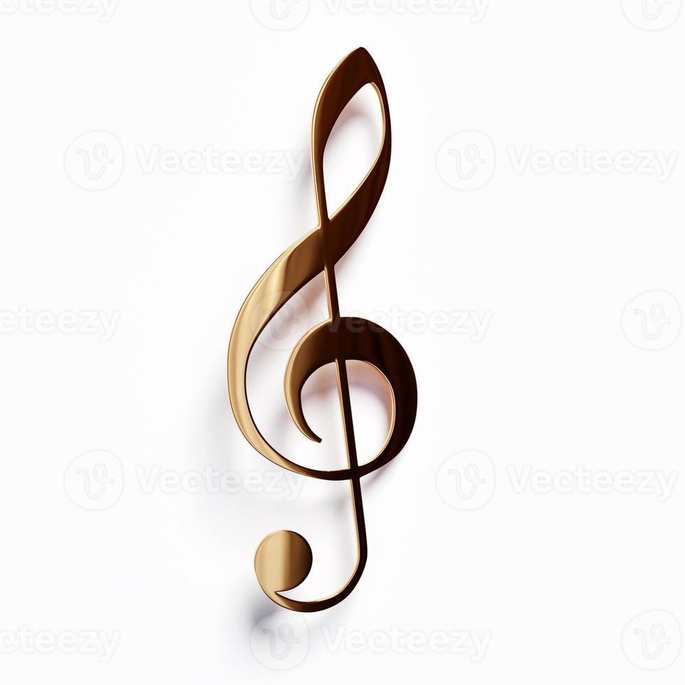 Realistic golden metal treble clef on a white background. photo