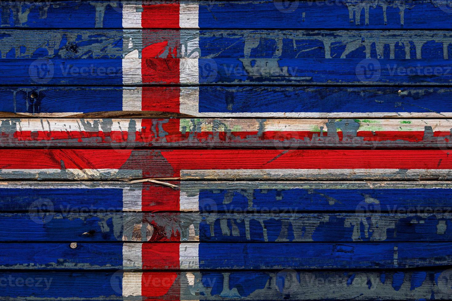 la bandera nacional de islandia está pintada en tablas irregulares. símbolo del país. foto