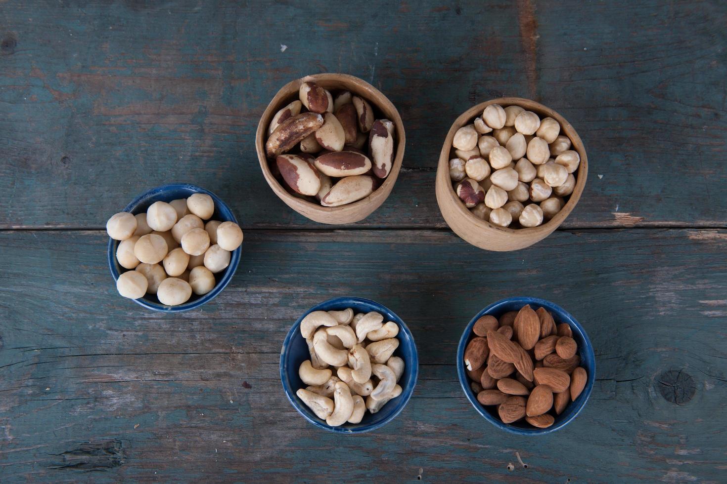 Nuts on wooden background photo