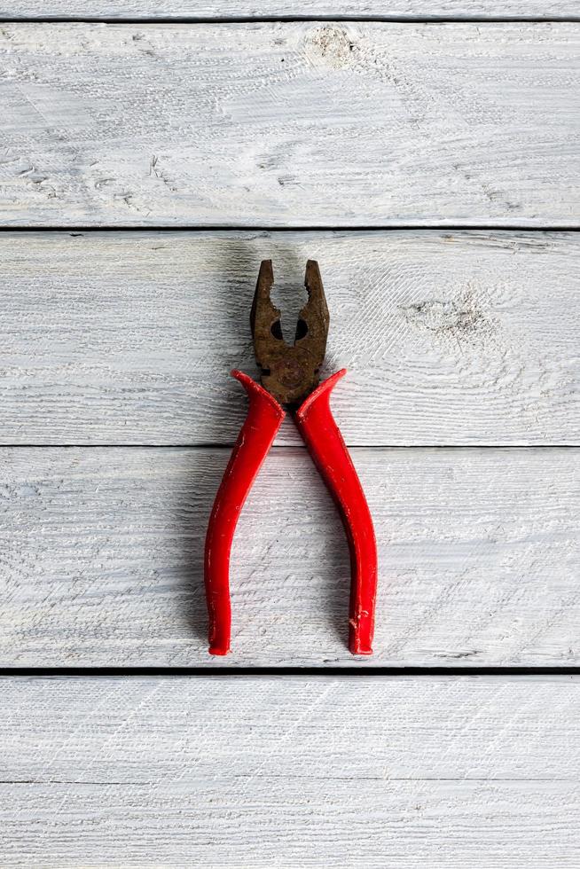 Tools on a wooden background photo