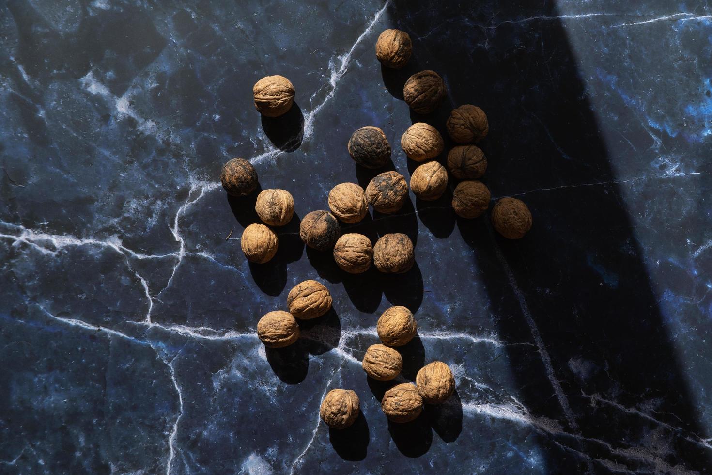 Walnuts on rustic background photo