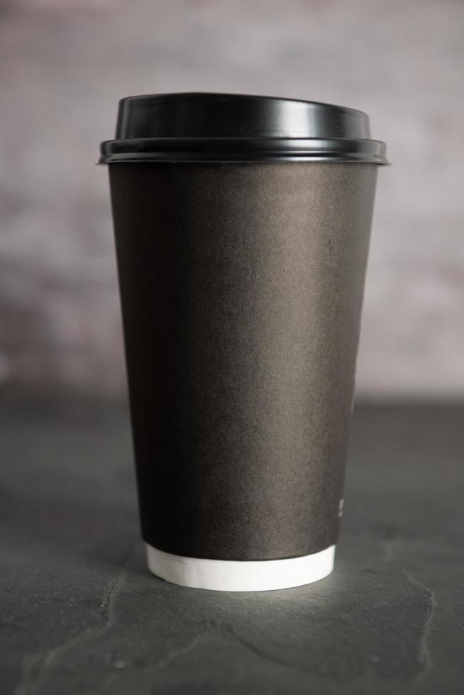 Paper cup on granite table photo