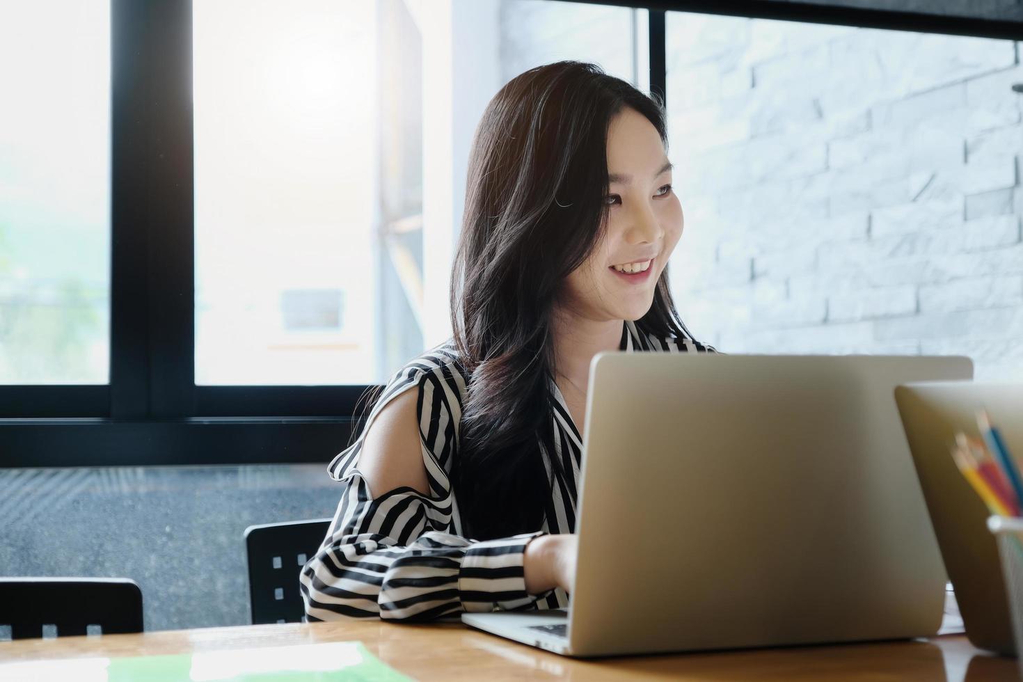 freelance concept,female using computers to design work as ordered by customers. photo