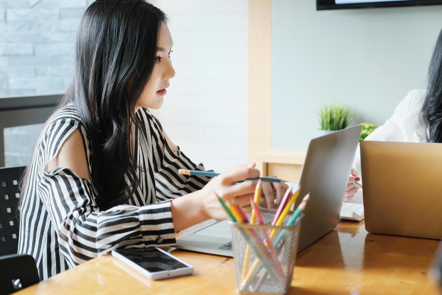 freelance concept,female using computers to design work as ordered by customers. photo