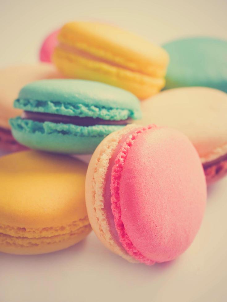 Colorful pastel macarons in vintage style. Sweet macarons with pastel colors. photo