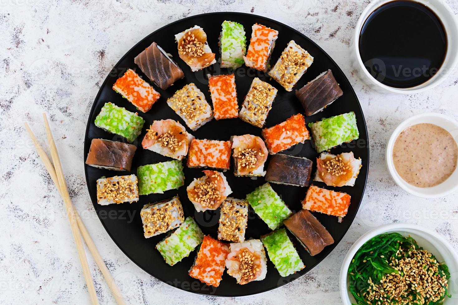 Sushi roll on white background. Top view photo