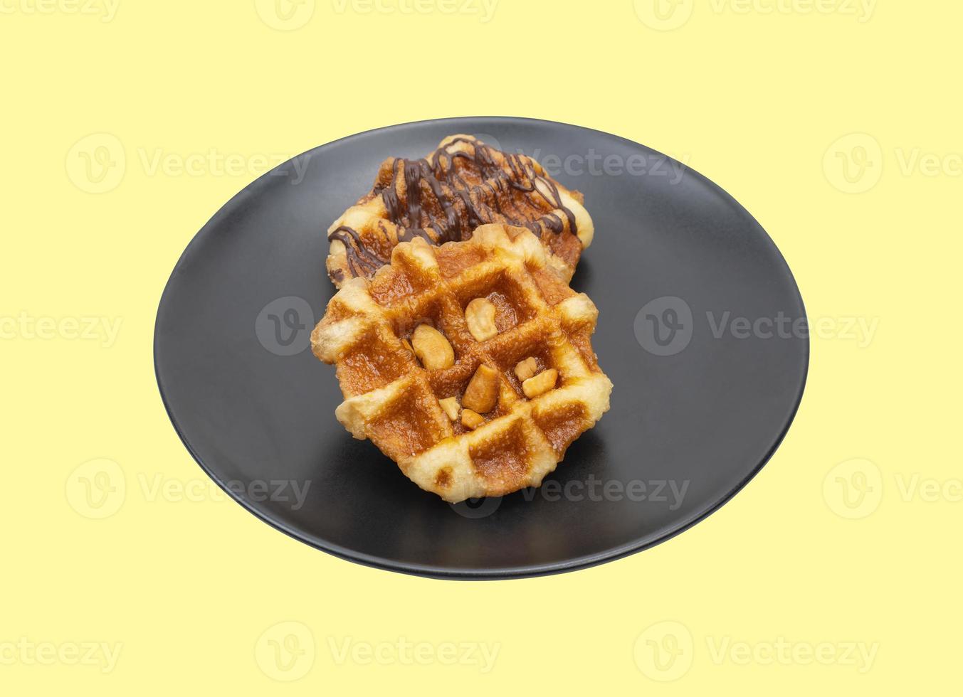 Fresh waffles with honey isolated on white background. photo