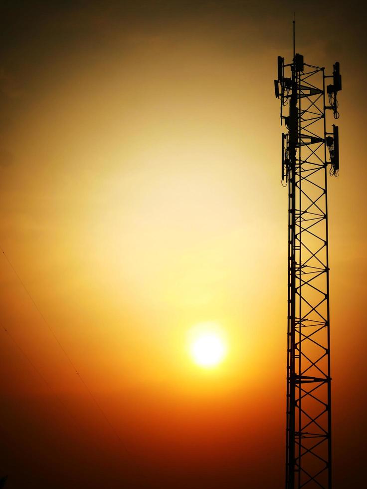 Telephone towers used to broadcast signals at dusk. photo