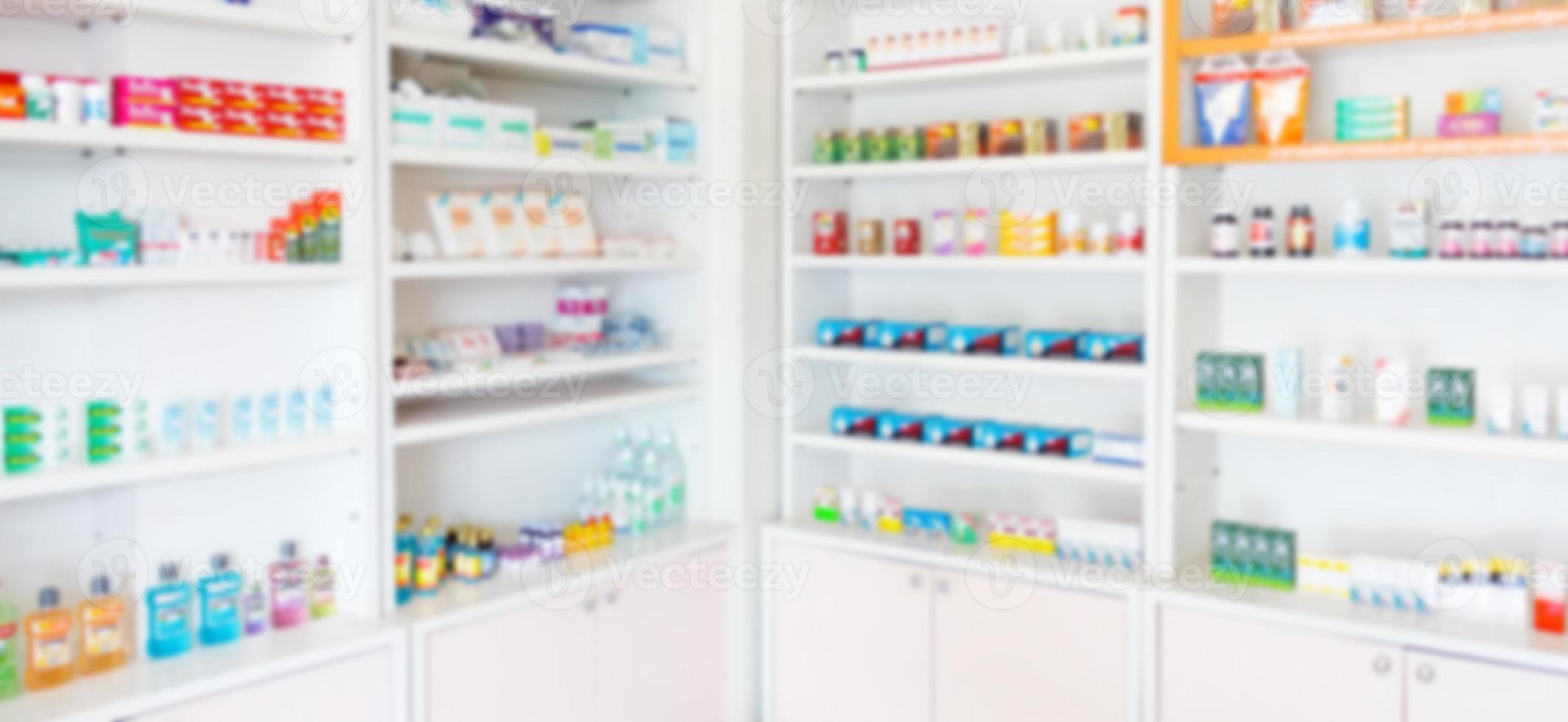 Pharmacy drugstore blur abstract backbround with medicine and healthcare product on shelves photo