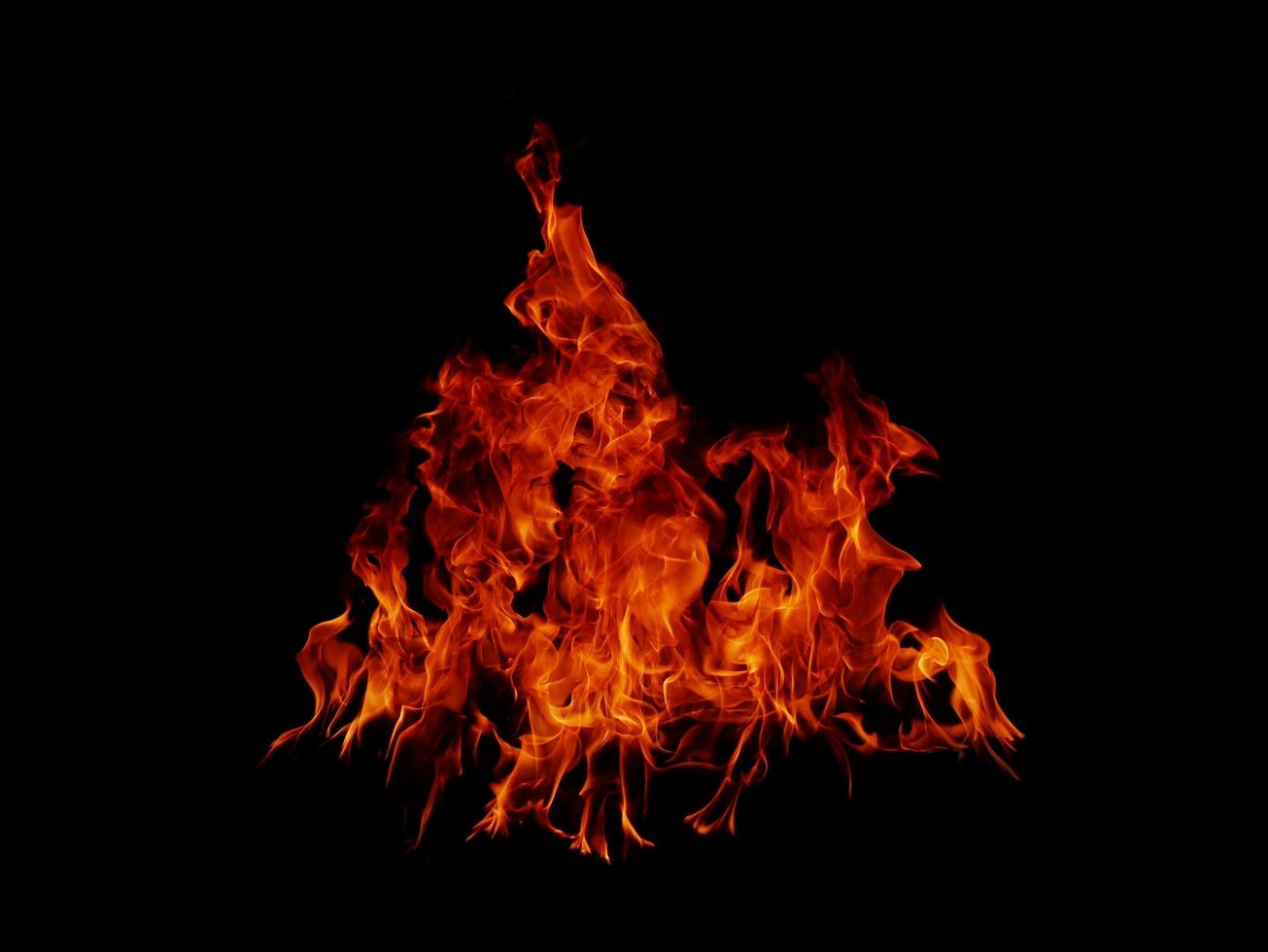 Flame Flame Texture For Strange Shape Fire Background Flame meat that is burned from the stove or from cooking. danger feeling abstract black background Suitable for banners or advertisements. photo