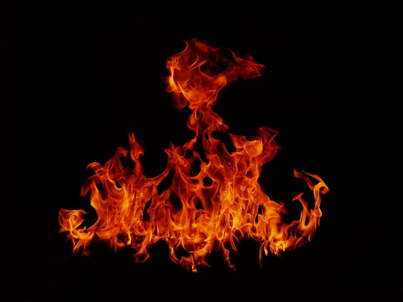 Flame Flame Texture For Strange Shape Fire Background Flame meat that is burned from the stove or from cooking. danger feeling abstract black background Suitable for banners or advertisements. photo