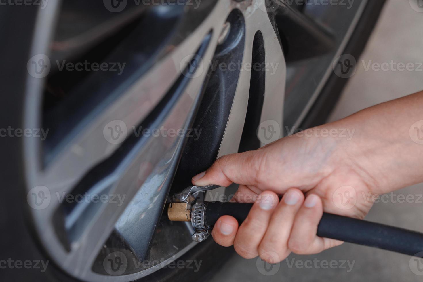 Drivers closely monitor air pressure and fill the tires. photo