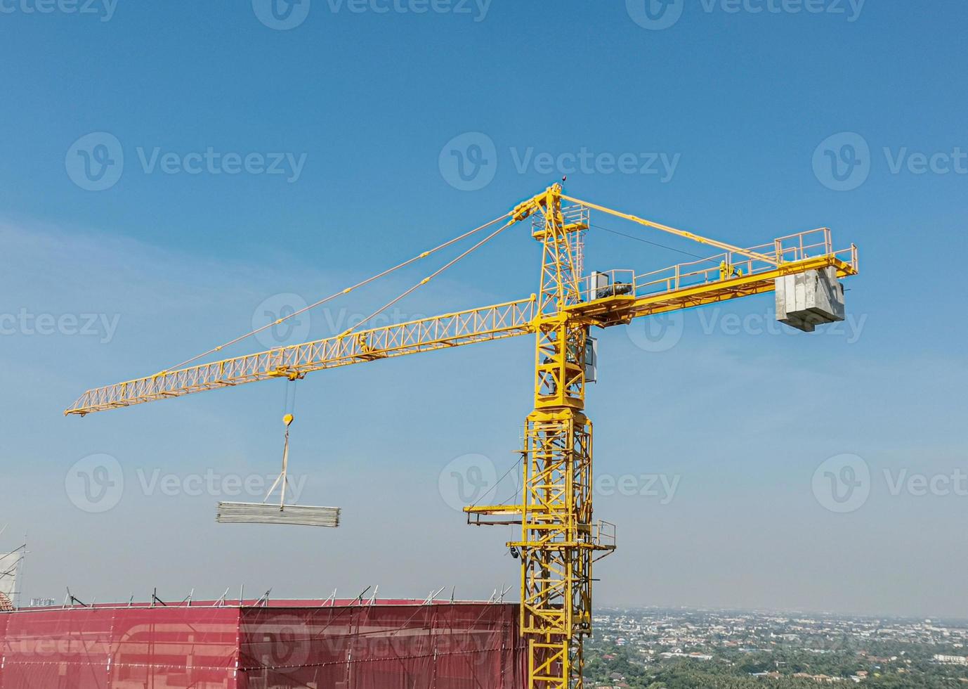 The Crane tower in construction  site of a high-rise condominium. photo