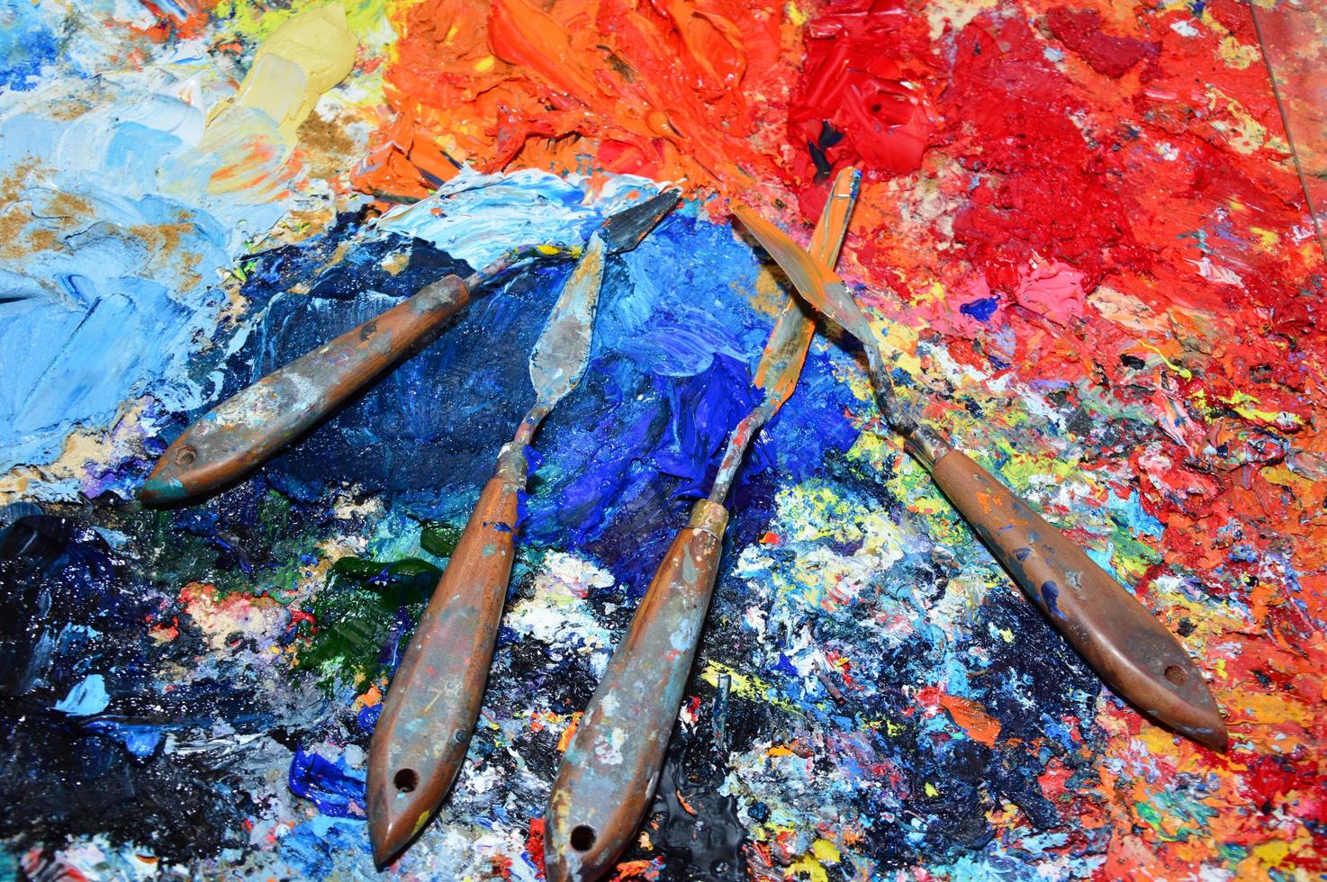 Closeup on painters palette in his workshop photo