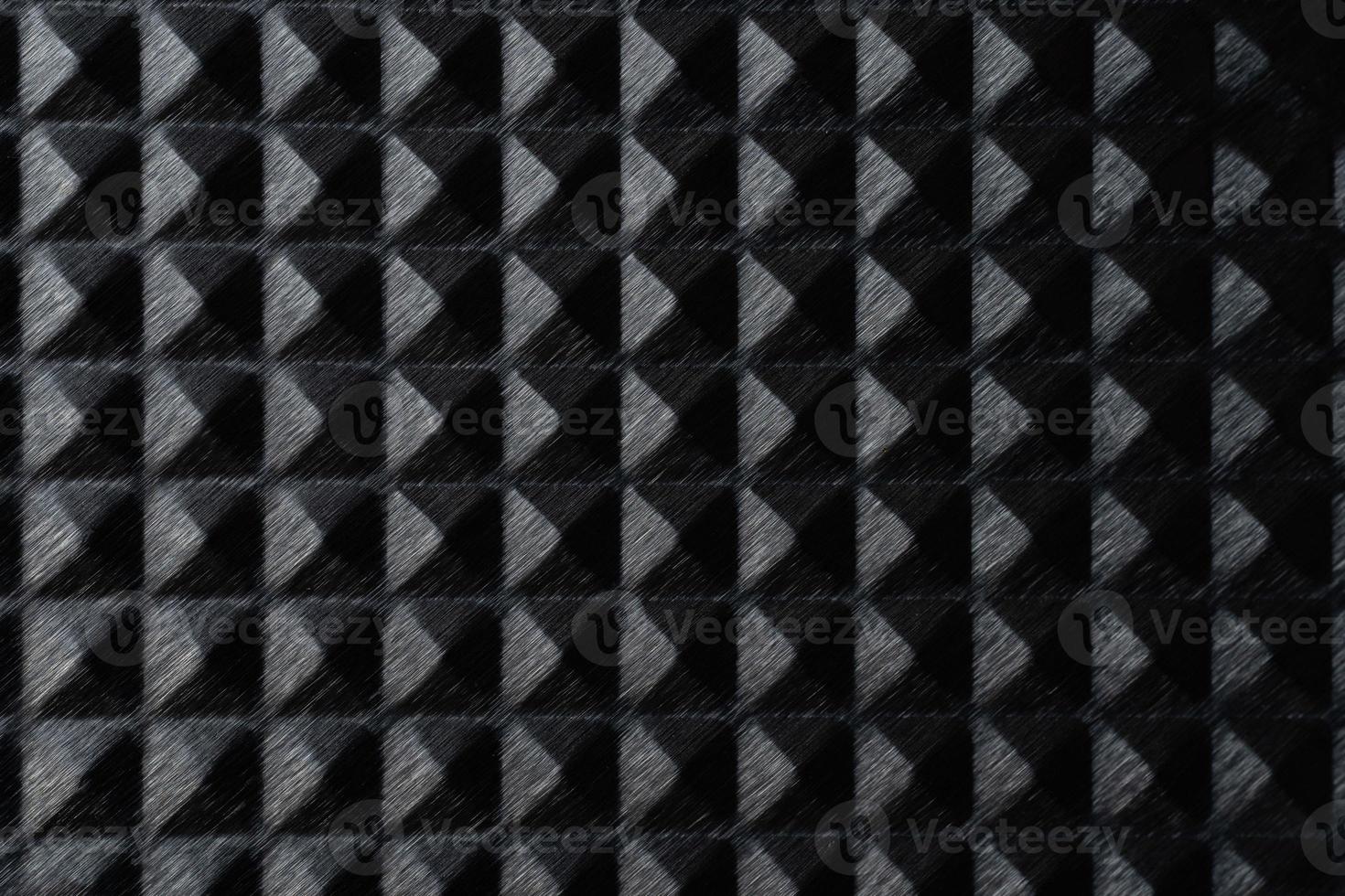 Tripartite brushed metal pyramid texture photo