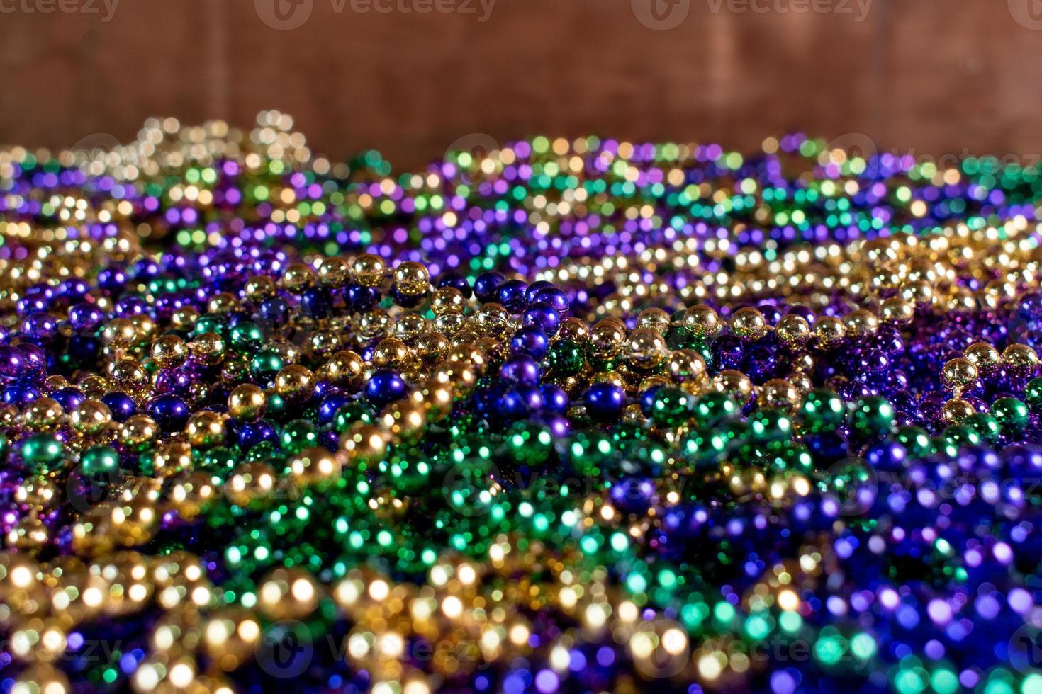 Close-up of Mardi Gras beads in pile photo