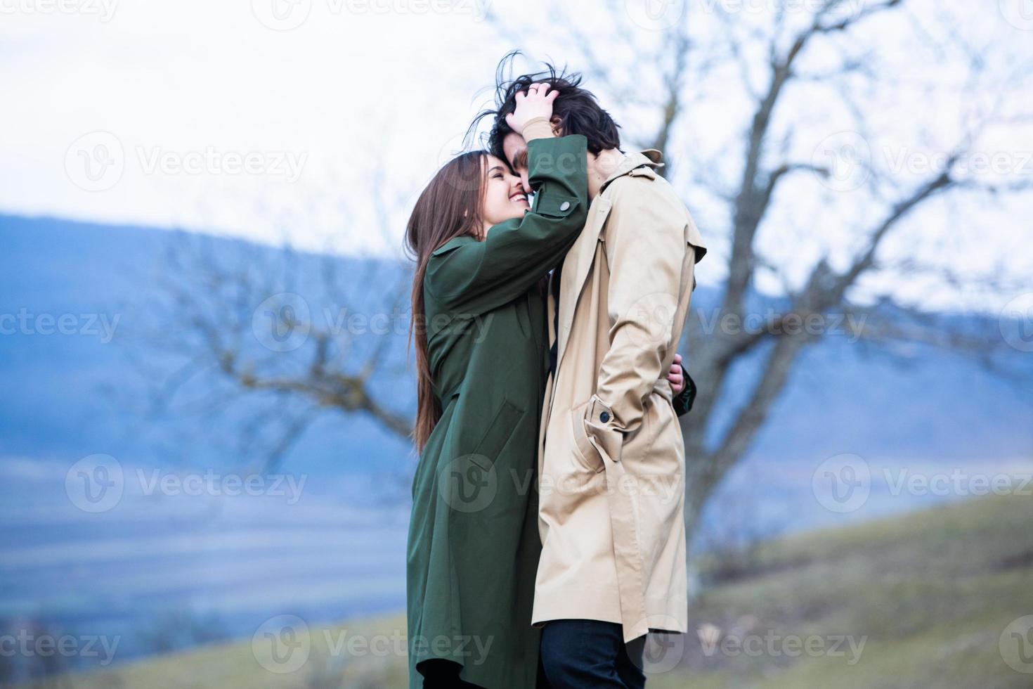 Beautiful sensual portrait of young stylish couple in love.Image of adorable brunette couple in love. Happy family. photo