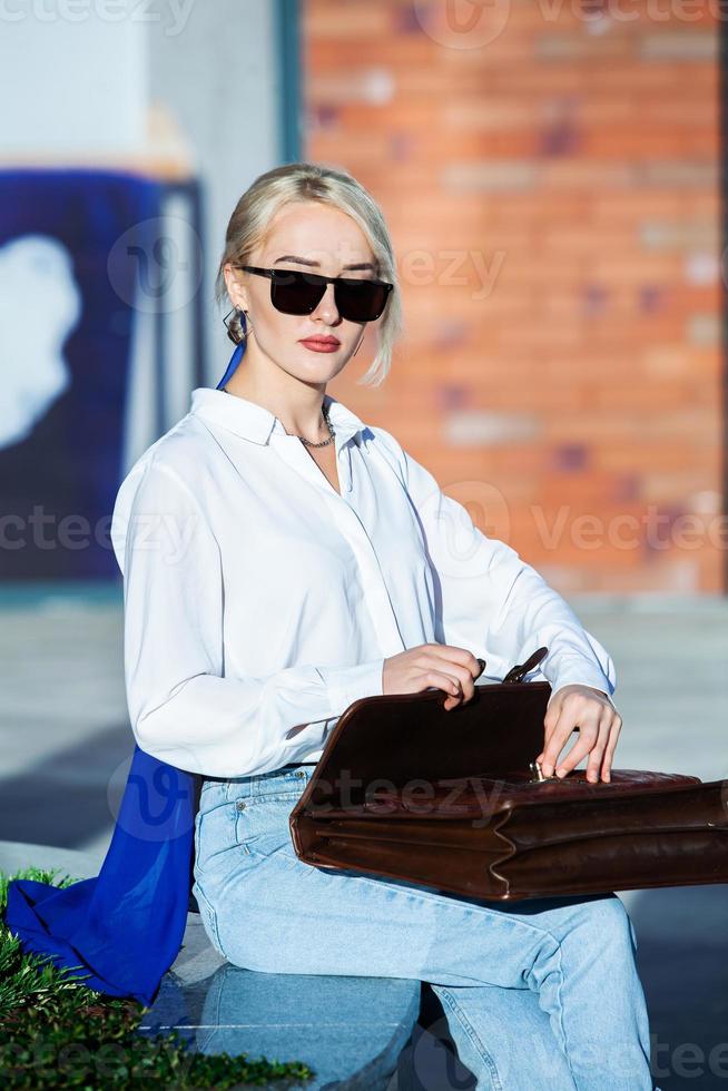 Portrait Of Successful Business Woman. Blonde european girl. Russian business lady. Hipster girl outfits. photo