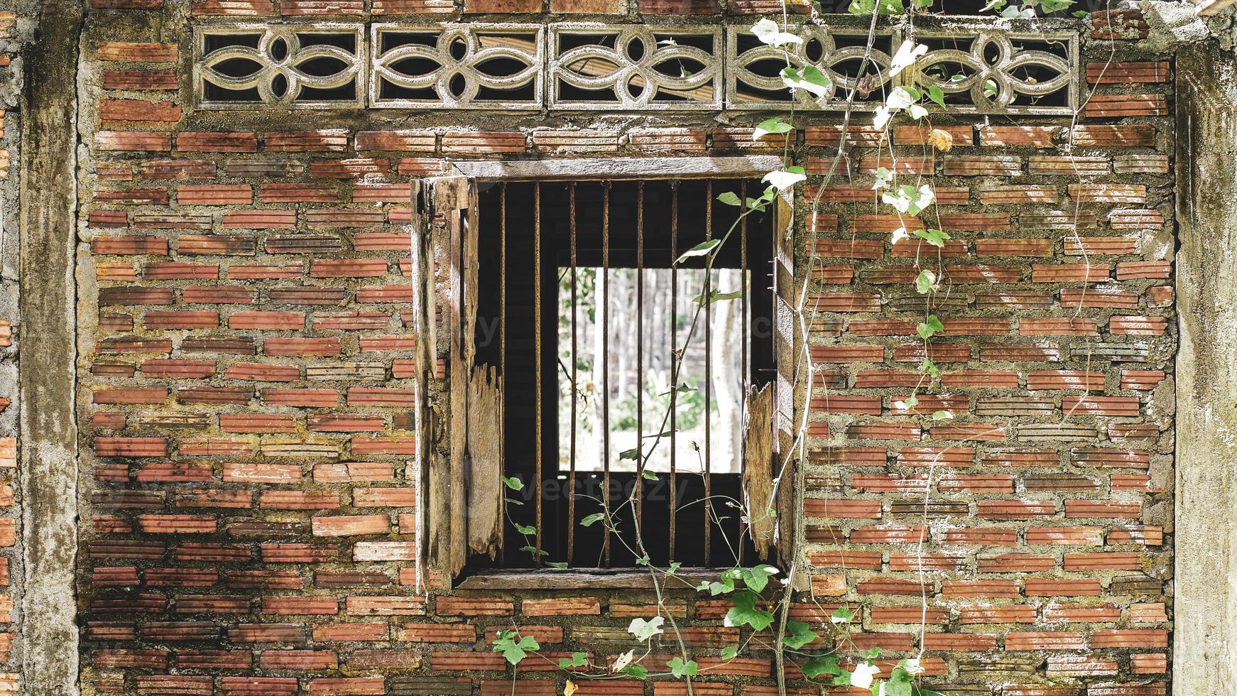 Window of an old abandoned house. Scary. Scary place concept. photo