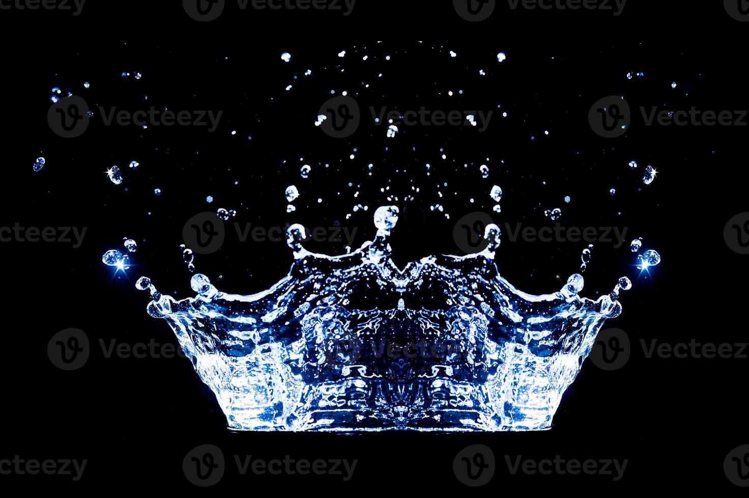 water splash isolated on the black background photo