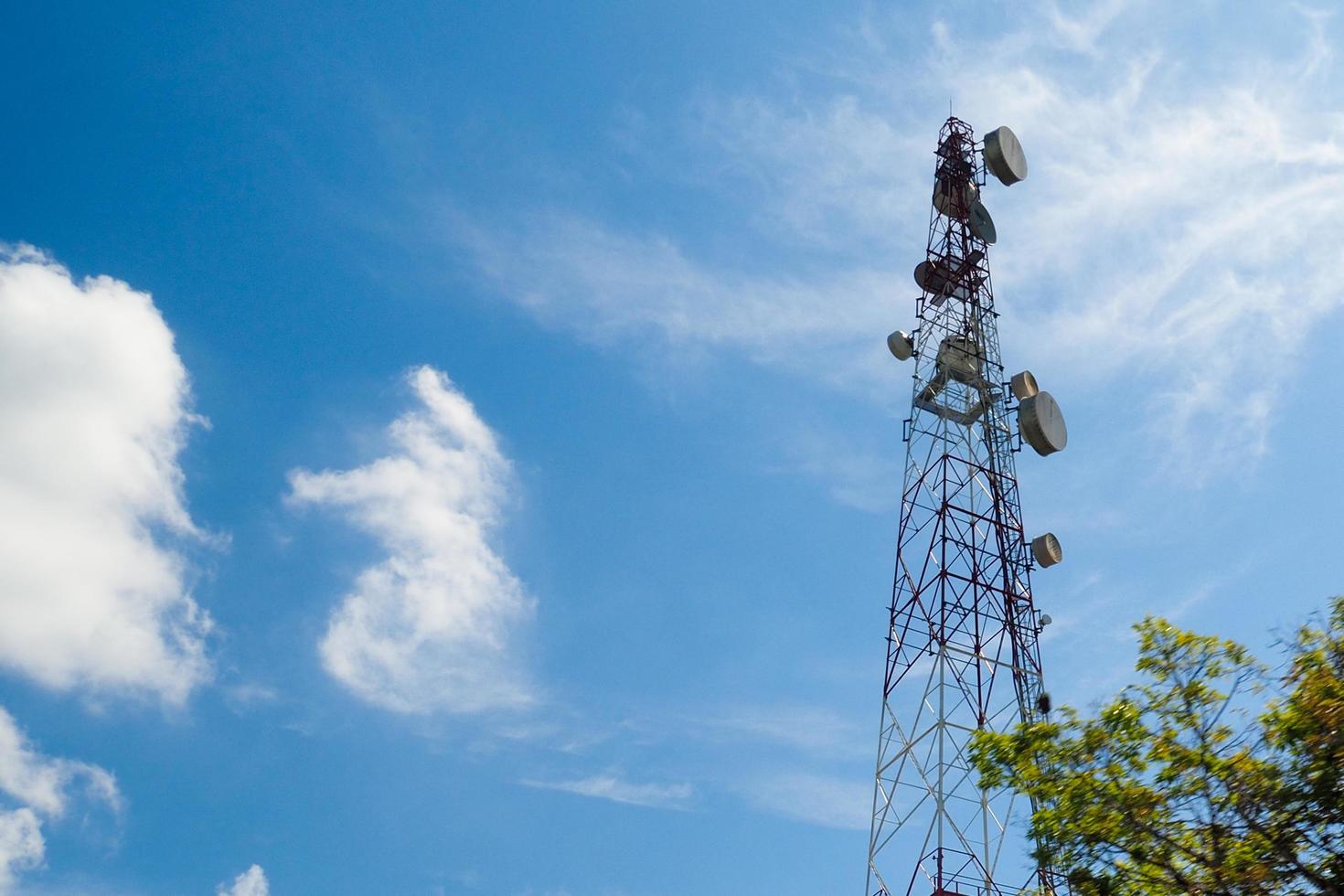 Large satellite communication towers in Thailand with the background of the sky photo