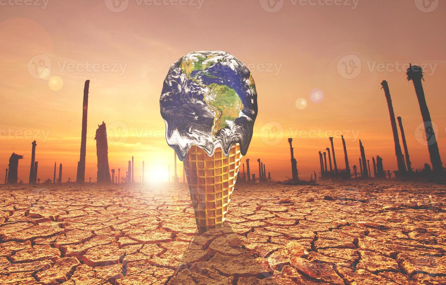 The concept of global warming and environmental change. Melting world on ice cream cone photo