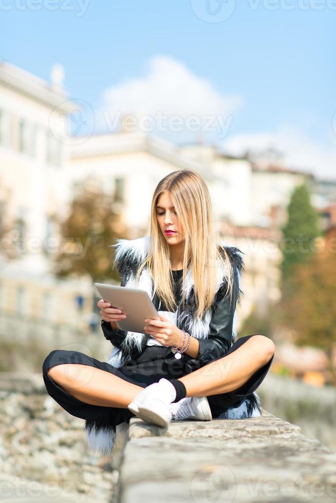Girl with tablet photo